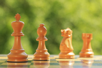 White chess figures on a chessboard