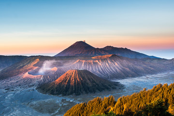 Mount Bromo volcano (Gunung Bromo) during sunrise from viewpoint on Mount Penanjakan, in East Java,...