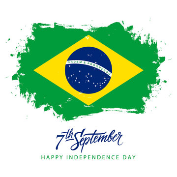 Brazil Independence Day, 7 september greeting card with hand lettering and brazilian national flag brush stroke background. Vector illustration.