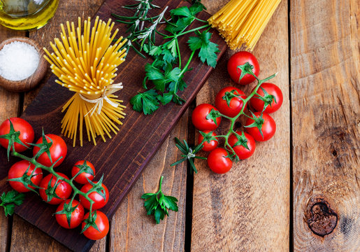 Raw Italian Spaghetti and Ingredients For Cooking Pasta