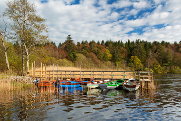 Fototapeta na wymiar Boats on lake in Killarney National Park, Co. Kerry - Ireland