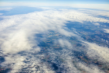 Fototapeta premium View over clouds from an airplane