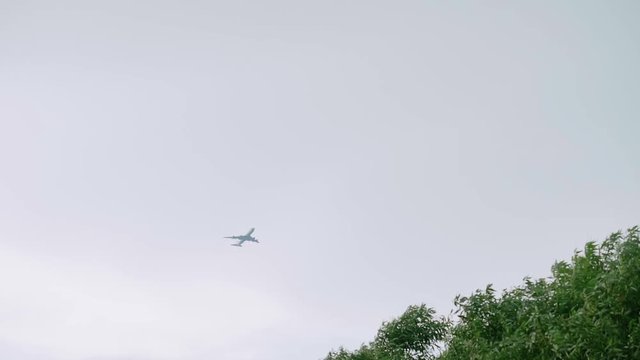 Bottom view of descenting plane before landing