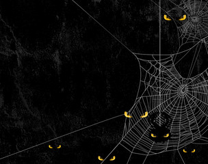 Fototapeta premium Sylwetka pajęczyny na czarnej odrapanej ścianie i złych żółtych oczach - straszne tło halloween motyw z miejscem na tekst