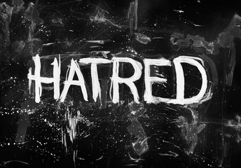 Hatred - negative feeling of aversion, animosity and hostility. Hand-drawn text on dark black...