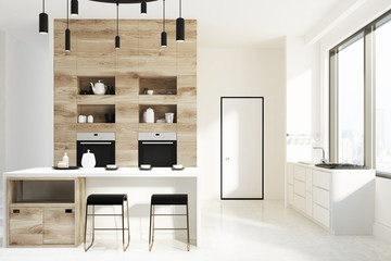 White and wooden kitchen bar, door