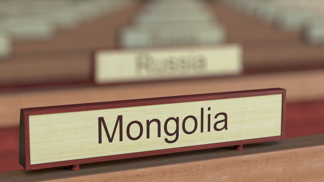 Mongolia name sign among different countries plaques at international organization. 3D rendering