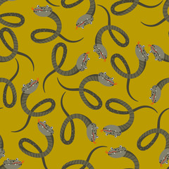 Seamless pattern with snakes on agreen background