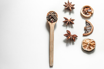 spices in a spoon isolated on white background,