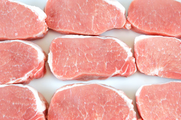 fresh chopped pork tenderloin isolated on white background
