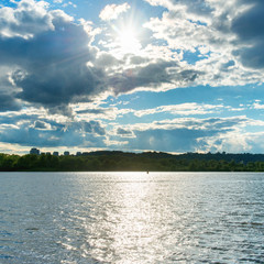 Sunset over blue river