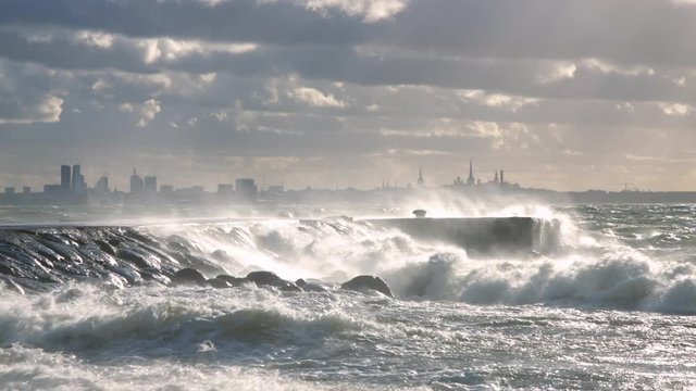 Big waves hitting the pier