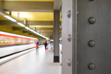 Underground station with arriving Train and blurred background