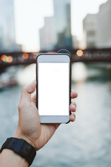 Hand holding smartphone