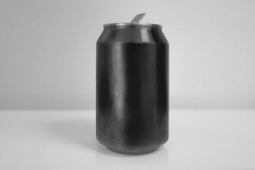 Aluminum Black Soda Can over White Background
