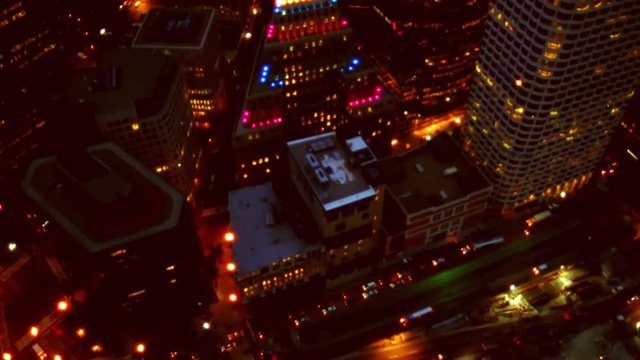 Aerial shot of glittering city at night.