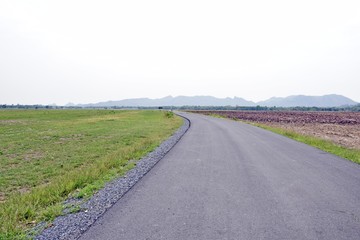 Longways road in countryside of Thailand