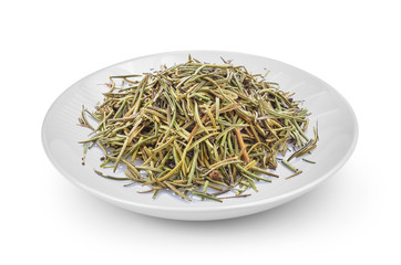 Dried rosemary leaves ina  plate isolated on a white background