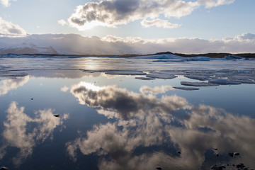 Beautiful Iceland winter season lake with sky reflection, natural landscape background
