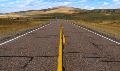 Fototapeta na wymiar Freshly Painted and repaired country road