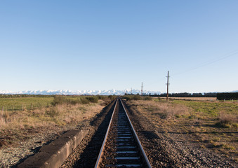 Fototapeta na wymiar Railway and Southern Alps
