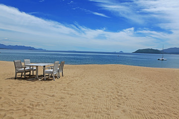 Chairs and table on Nha Trang beach, Vietnam