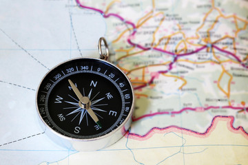 Fototapeta na wymiar Map with compass. Simple navigation tools to orient in the world.