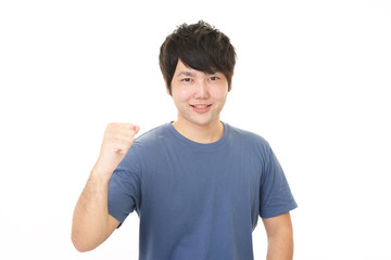 ガッツポーズの男性