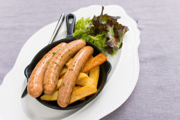 delicious sausages with french fries