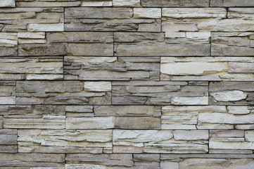 Abstract background, texture of the wall surface of the treated stone