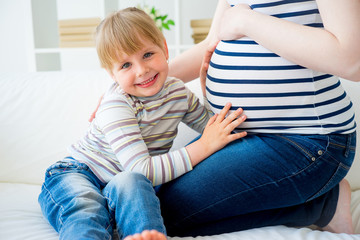 Fototapeta premium Girl expecting a sister