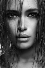 Fototapeta premium Beautiful woman with wet hair and make-up