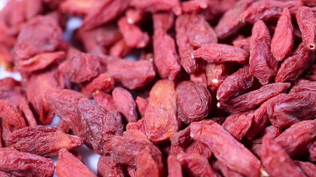 Healthy eating and diet concept - dried goji berries.