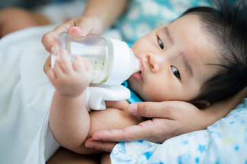 mom feed power mile to her baby