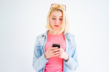 Fototapeta premium Stylish girl using phone
