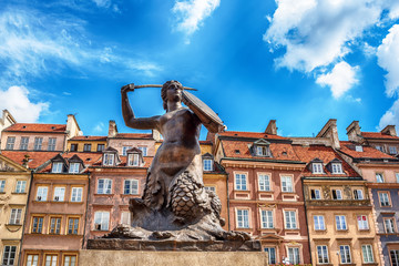 The Statue of Mermaid of Warsaw, Polish Syrenka Warzawska, a symbol of Warsaw in the old town of city - obrazy, fototapety, plakaty