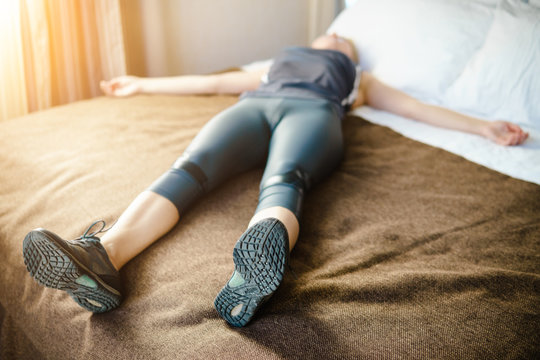 Woman having a rest after run and hard workout.