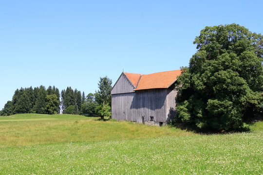 Old barn on the edge of a village