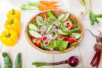 vegetable salad bowl on kitchen table, balanced diet