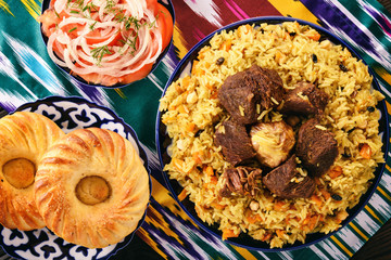 Pilaf- traditional asian dish, rice prepared with vegetables and meat. Oriental, uzbek style.