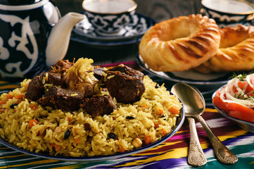 Pilaf- traditional asian dish, rice prepared with vegetables and meat. Oriental, uzbek style.
