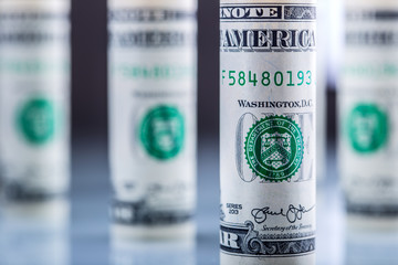 Dollar. American dollar banknotes rolled in different positions