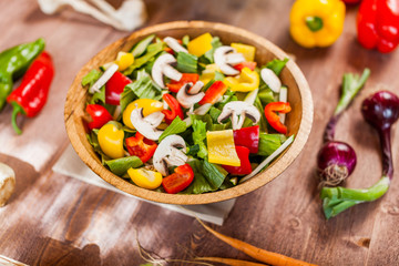 vegetable salad bowl on kitchen table, balanced diet