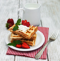 belgian waffles with strawberries and mint