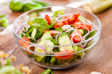 vegetable salad bowl on kitchen table, balanced diet