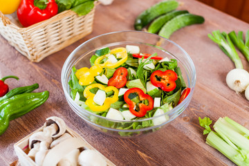 vegetable salad bowl on kitchen table, balanced diet