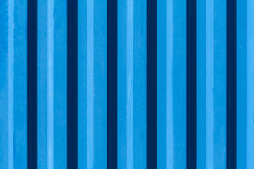 Metallic rippled surface of blue color (texture, background)