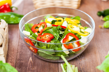 vegetable salad bowl on kitchen table, balanced diet