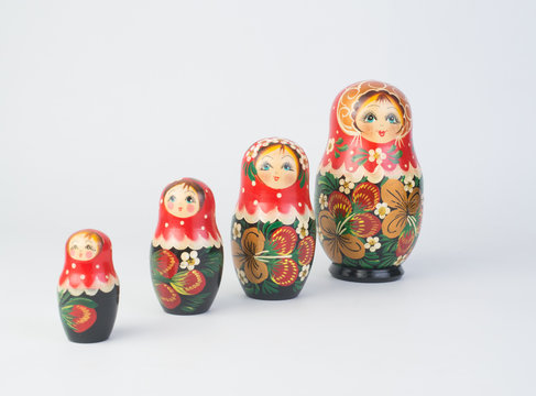 Travel around the world for your colorful life .Enjoy the funny trip journey .Top view for copy space some idea your create destination .object  cute  ,  Set of matrioshka dolls on white background.