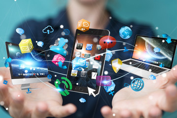 Tech devices connected to each other by businesswoman 3D rendering